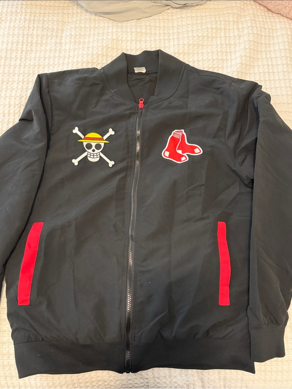 Onepiece Black Varsity Jacket with Red Accents